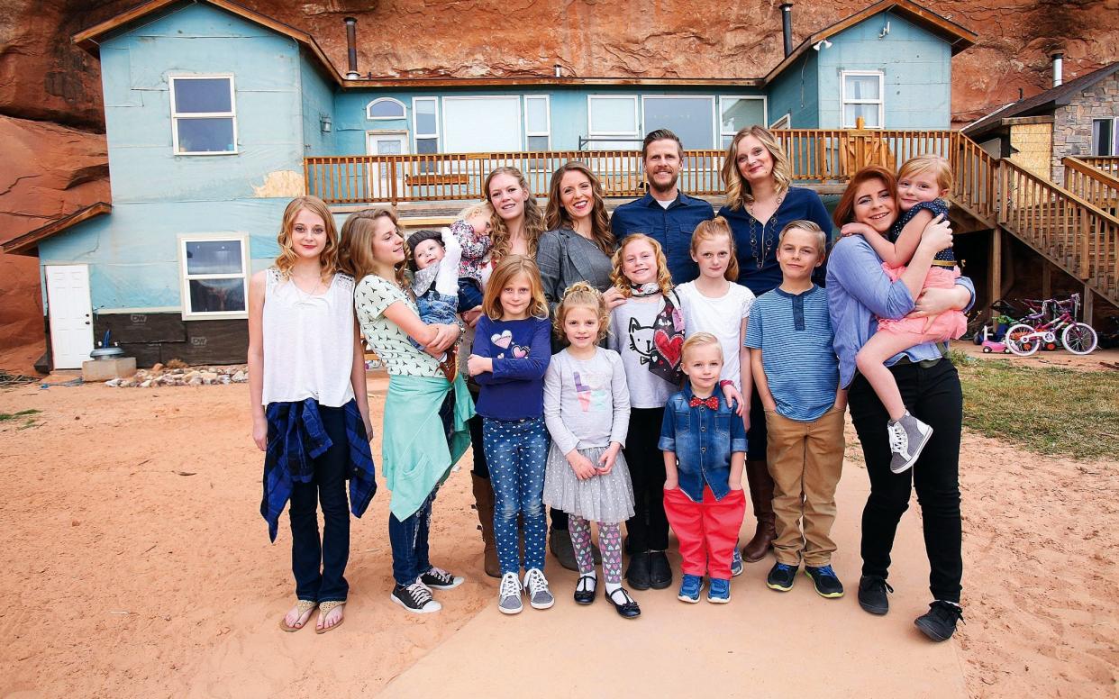 Abel Morrison with his three wives, and their 12 children - Vance Jacobs