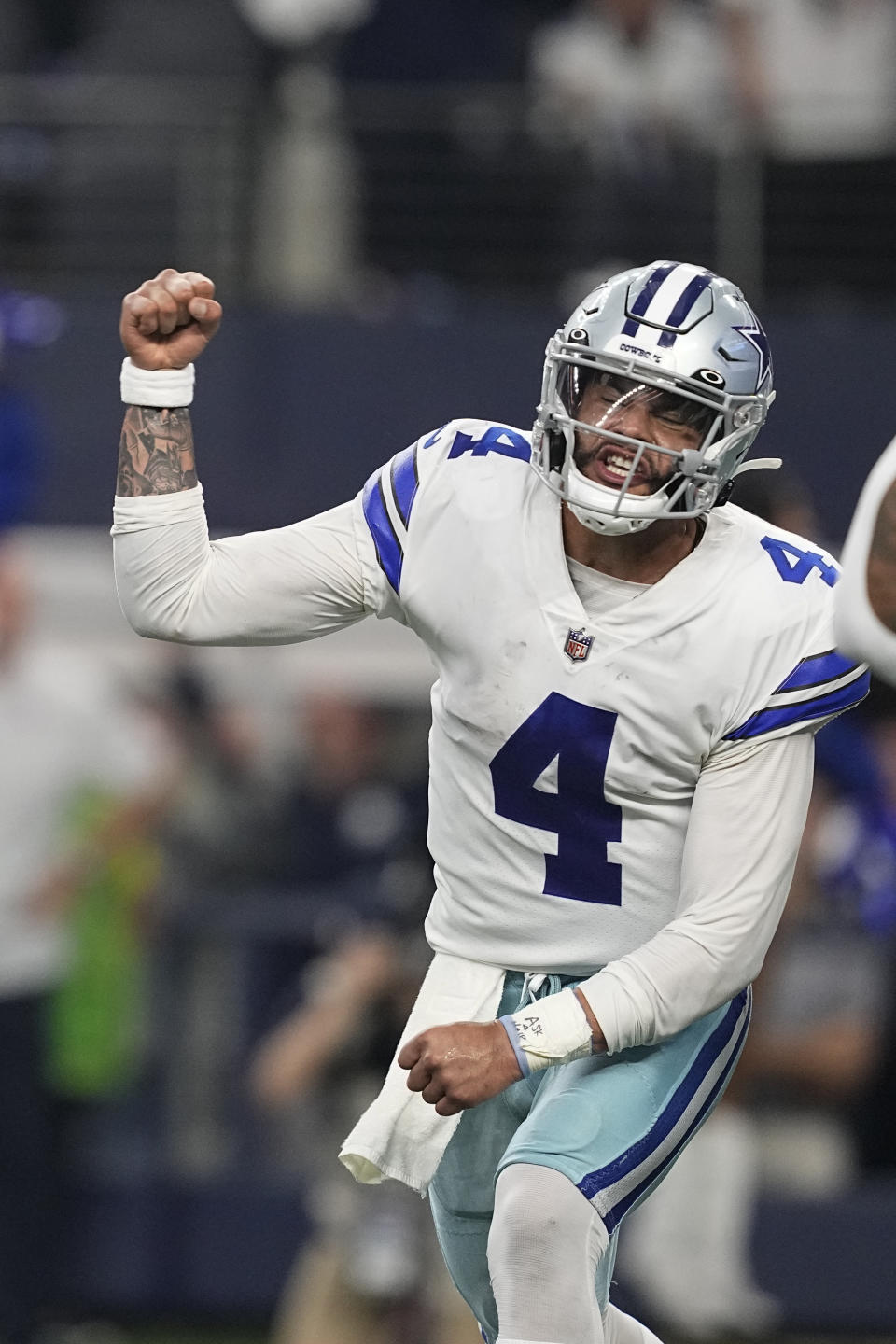 Dallas Cowboys quarterback Dak Prescott (4) reacts after a pass was ruled incomplete during the second half of an NFL football game against the Houston Texans, Sunday, Dec. 11, 2022, in Arlington, Texas. (AP Photo/Tony Gutierrez)