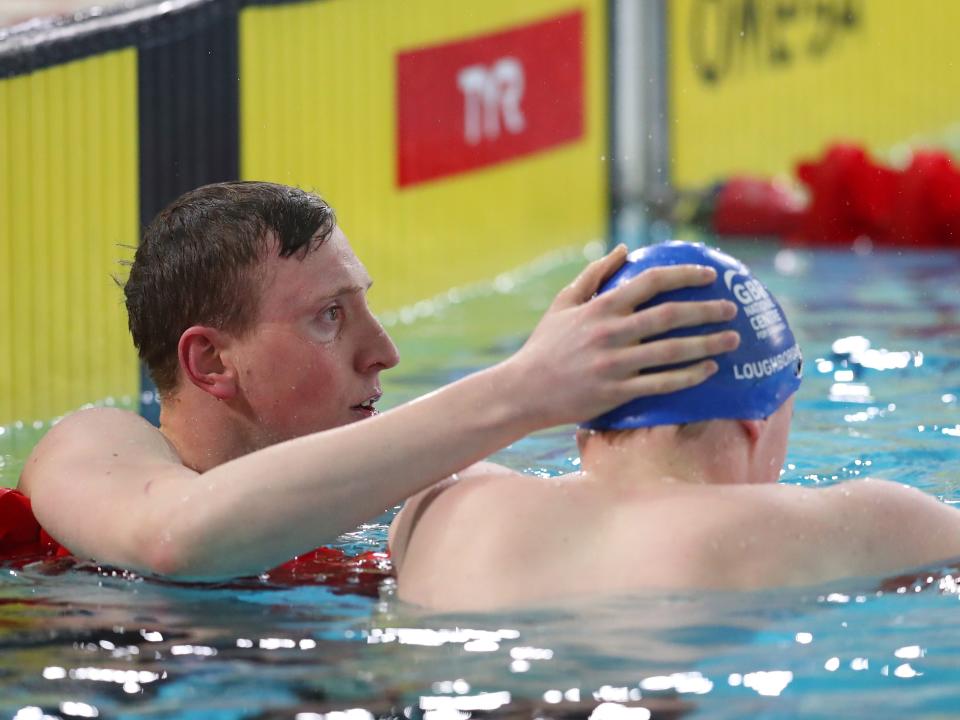 Swimmer Max Litchfield consoles his brother Joe