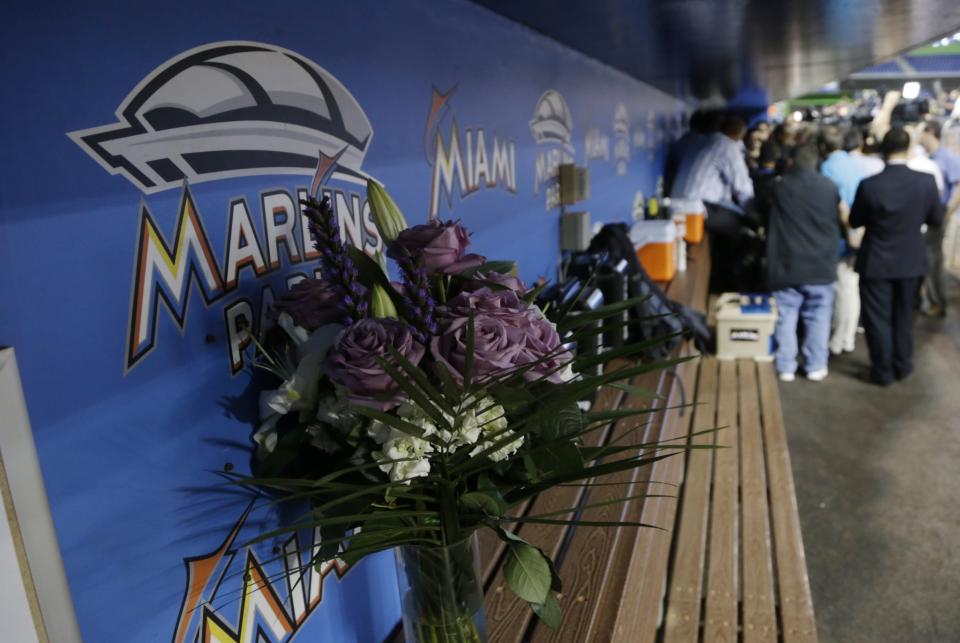 <p>A vase of flowers sits in the Miami Marlins’ dugout in honor of Marlins pitcher Jose Fernandez before a baseball game between the Marlins and the New York Mets, Monday, Sept. 26, 2016, in Miami. Fernandez was killed in a boating accident early Sunday. (AP Photo/Lynne Sladky) </p>