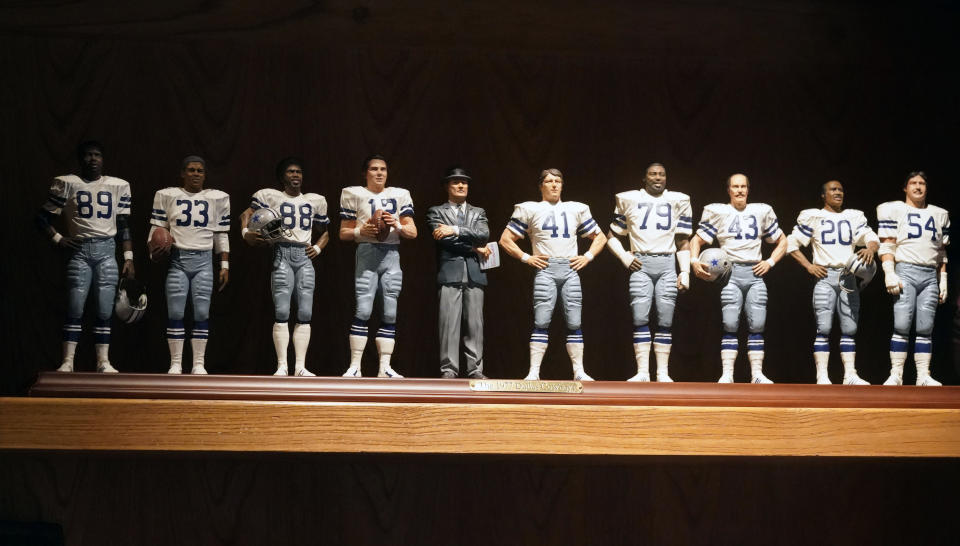 The miniature likeness of the 1977 Dallas Cowboys team is displayed on a shelf at the home of former Cowboys and NFL football great Cliff Harris (43) in North Dallas, Wednesday, June 30, 2021.Harris and receiver Drew Pearson, who also will be inducted this year as part of the class of 2021, are the first undrafted Cowboys among their 15 players in the Hall of Fame. (AP Photo/LM Otero)