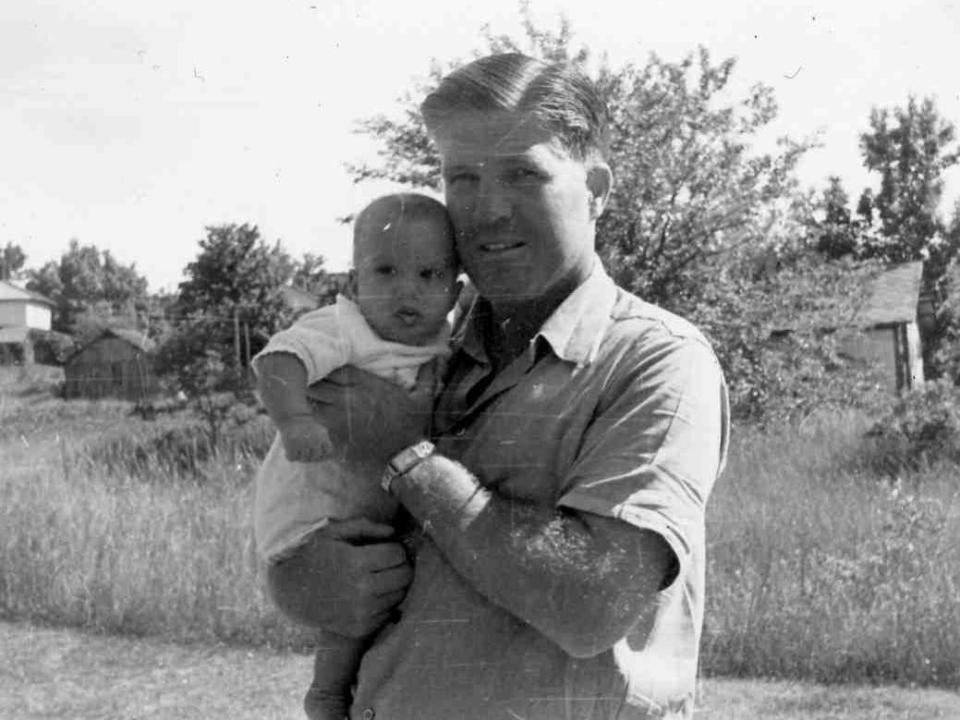 Mitt Romney in a family archive photo with his father in 1947.