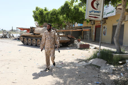 A member of Libyan internationally recognised government forces is seen at Al-Swani area in Tripoli, Libya April 18, 2019. REUTERS/Ahmed Jadallah