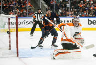 Philadelphia Flyers goalie Carter Hart (79) makes the save as Edmonton Oilers' Kailer Yamamoto (56) looks for the rebound during the second period of an NHL hockey game, Wednesday, Oct. 27, 2021 in Edmonton, Alberta. (Jason Franson/The Canadian Press via AP)