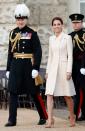 <p>For a military ceremony in London, Kate chose an off-white coat dress (one of <a href="https://www.townandcountrymag.com/style/fashion-trends/news/g1633/kate-middleton-fashion/" rel="nofollow noopener" target="_blank" data-ylk="slk:her go-to styles;elm:context_link;itc:0;sec:content-canvas" class="link ">her go-to styles</a>).</p>