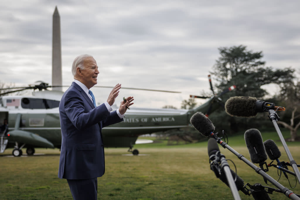  President Joe Biden speaks to members of the media on the South Lawn of the White House. 