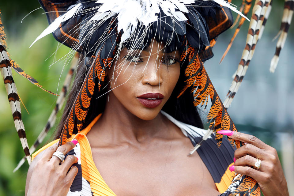 <p>A racegoer during Ladies Day at the Royal Ascot horse races in Ascot, Britain on June 22, 2017. (Toby Melville/Reuters) </p>