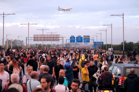 Protesters block a road towards Barcelona's airport, after a verdict in a trial over a banned independence referendum