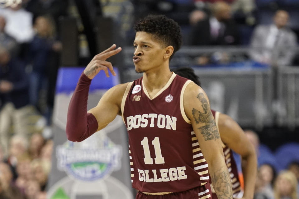 Boston College guard Makai Ashton-Langford (11) celebrates after making a 3-point basket against North Carolina during the first half of an NCAA college basketball game at the Atlantic Coast Conference Tournament in Greensboro, N.C., Wednesday, March 8, 2023. (AP Photo/Chuck Burton)