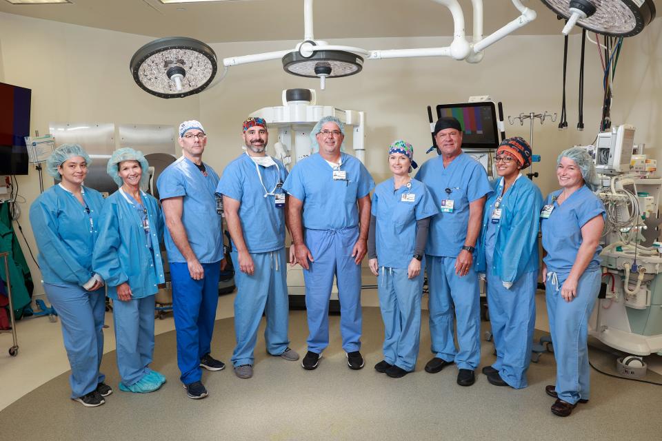 An operating room team at HCA Florida Blake Hospital poses for a photo. The hospital earned a B grade in the Fall Leapfrog Group report card, after slipping back to a C in the Spring 2022 grades.