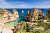 <p>Portugal is known for its <a href="https://www.goldenvisas.com/portugal" rel="nofollow noopener" target="_blank" data-ylk="slk:Golden Visa;elm:context_link;itc:0;sec:content-canvas" class="link ">Golden Visa</a>, which uses tax perks to attract foreign nationals. Recently, the Portuguese government has tightened rules regarding the visa scheme, due to a magnifying <a href="https://www.weforum.org/agenda/2024/02/how-lisbon-and-other-world-cities-are-tackling-the-affordable-housing-crisis/#:~:text=Housing%20prices%20between%202012%20and,affordable%20housing%20in%20the%20city." rel="nofollow noopener" target="_blank" data-ylk="slk:housing crisis;elm:context_link;itc:0;sec:content-canvas" class="link ">housing crisis</a>. Rather than investing in real estate, expats who transfer approximately $543,070 into one or more qualifying funds—including Pela Terra, a farmland fund that focuses on regenerative agriculture projects within Portugal, and <a href="https://sharingeducation.fund/" rel="nofollow noopener" target="_blank" data-ylk="slk:Sharing Education;elm:context_link;itc:0;sec:content-canvas" class="link ">Sharing Education</a>, which supports the country’s international school system—or pour $271,537 towards supporting the arts or preserving national heritage, qualify for the visa. You must then maintain that investment for five years (at which time you can apply for citizenship) in order to keep your Golden Visa status.</p> <p>Another great option for both retirees and semi-retirees is Portugal’s <a href="https://www.globalcitizensolutions.com/portugal-d7-visa/" rel="nofollow noopener" target="_blank" data-ylk="slk:D7 Passive Income Visa;elm:context_link;itc:0;sec:content-canvas" class="link ">D7 Passive Income Visa</a>. This popular residency program includes the option to become a non-habitual resident (and reap the aforementioned tax benefit), as well as the ability to actually work while there, whether it’s living life as a digital nomad or being employed at a Portuguese-run business. It even allows access to the country’s extensive healthcare system. The visa is valid for two years, and then can be renewed for three more. Five years in, you can apply for permanent citizenship.</p> <p><strong>Requirements:</strong> There are no age restrictions for the D7 visa, though you must demonstrate an annual passive income of at least $10,680 (plus $5,340 per adult, and $3,560 per dependent), which is equal to the country’s current minimum wage, to apply. To qualify for the Golden Visa, you can’t have paid taxes in Portugal over any of the last five years.</p>