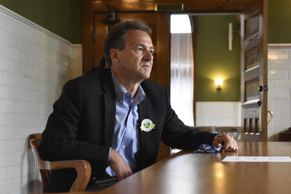 Montana Gov. Steve Bullock speaks to members of the business community in Billings, Mont., on July 24, 2020. The Democratic governor is asking a federal judge to oust the Trump administration official responsible for overseeing more than quarter-billion acres of public lands. (AP Photo/Matthew Brown)
