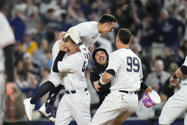 DJ LeMahieu of the New York Yankees poses with his wife during the