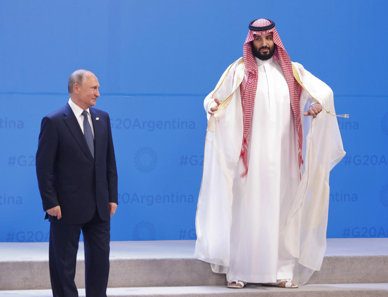 Russia’s President Vladimir Putin, left, and Saudi Arabia’s Crown Prince Mohammed bin Salmanr wait for other heads of state for a group photo at the start of the G-20 summit in Buenos Aires, Argentina, on Friday. (Photo: AP/Pablo Martinez Monsivais)