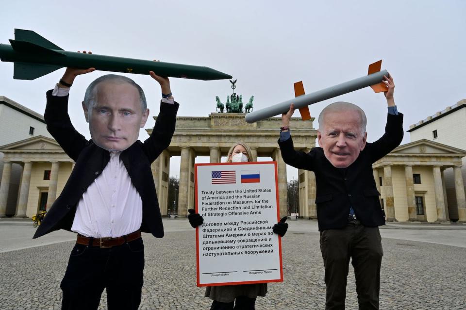 Peace protesters in Berlin call for more nuclear disarmament in 2021. <a href="https://media.gettyimages.com/photos/peace-activists-wearing-masks-of-russian-president-vladimir-putin-and-picture-id1230850574?s=2048x2048" rel="nofollow noopener" target="_blank" data-ylk="slk:John MacDougall/AFP via Getty Images;elm:context_link;itc:0;sec:content-canvas" class="link ">John MacDougall/AFP via Getty Images</a>