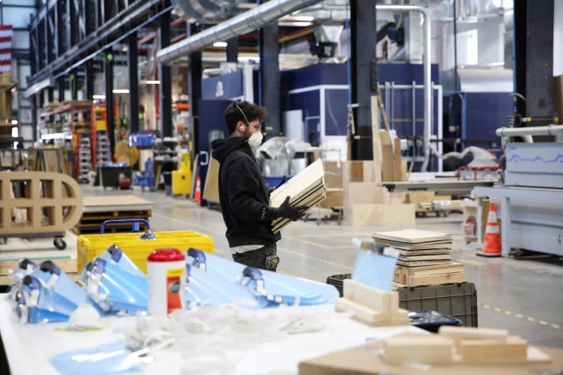 Workers at Bednark produce medical face shields, as the demand for their production rapidly increased