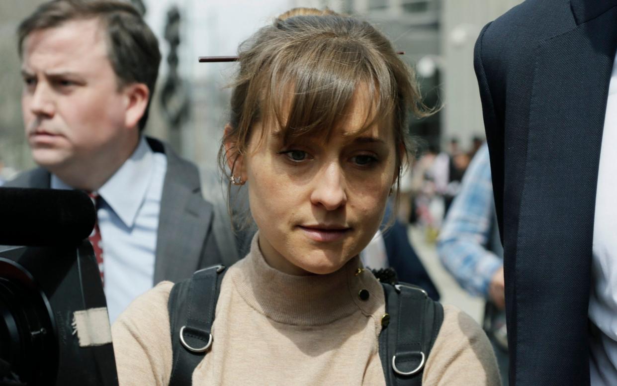 Allison Mack pleaded guilty to charges she manipulated women into becoming sex slaves - AP Photo/Mark Lennihan, File