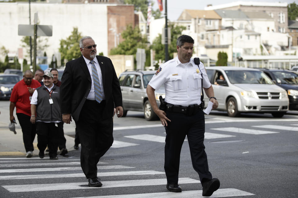 Bureau of Alcohol, Tobacco, Firearms and Explosives special agent in charge Don Robinson, left, and Allentown Police Chief Tony Alsleben, arrive at a news conference near the scene of Saturday's fatal car explosion in Allentown, Pa., Monday, Oct. 1, 2018. (AP Photo/Matt Rourke)