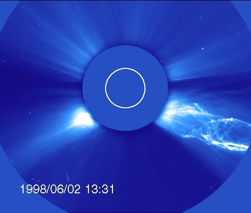 An image of a twisting, helical-shaped coronal mass ejection (CME) rushing away from the sun. To study CMEs that come from the sun, scientists can block the main body and study the outer atmosphere, but this isn't an option for other stars.