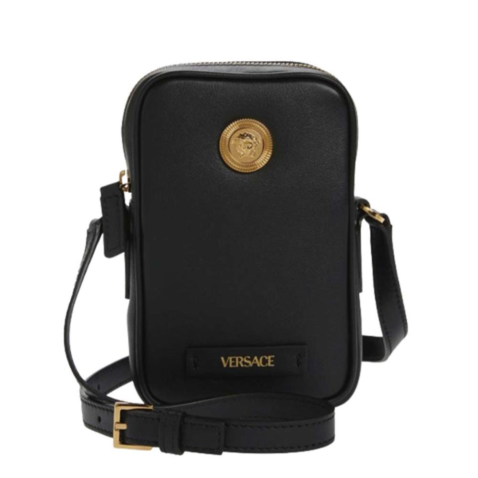 black leather phone crossbody bag with gold hardware