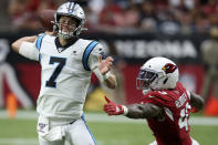 Carolina Panthers quarterback Kyle Allen (7) throws as Arizona Cardinals outside linebacker Haason Reddick (43) pursues during the second half of an NFL football game, Sunday, Sept. 22, 2019, in Glendale, Ariz. (AP Photo/Ross D. Franklin)