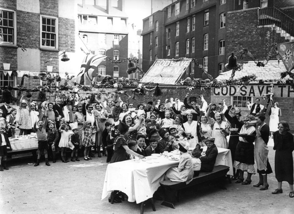 A party to celebrate the Silver Jubilee of King George V at Tregenna Street, Brixton, in 1935 - GETTY