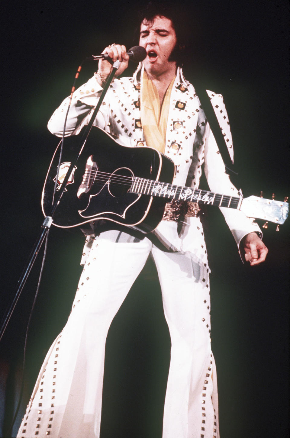 FILE --In a 1973 file photo Elvis Presley performs on stage in an unspecified location. A three-CD box set slated for release the first week of August 2013 chronicles two recording sessions by Elvis Presley at the renowned Stax Records in Memphis in 1973. (AP Photo, files)