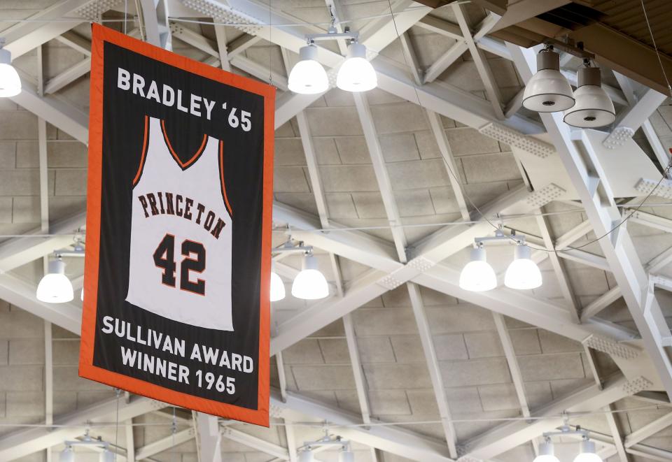 Bill Bradley's #42 hangs from the roof of Princeton University's Jadwin Gym Monday afternoon, March 20, 2023.  The basketball team were there preparing for their NCAA Sweet 16 appearance.