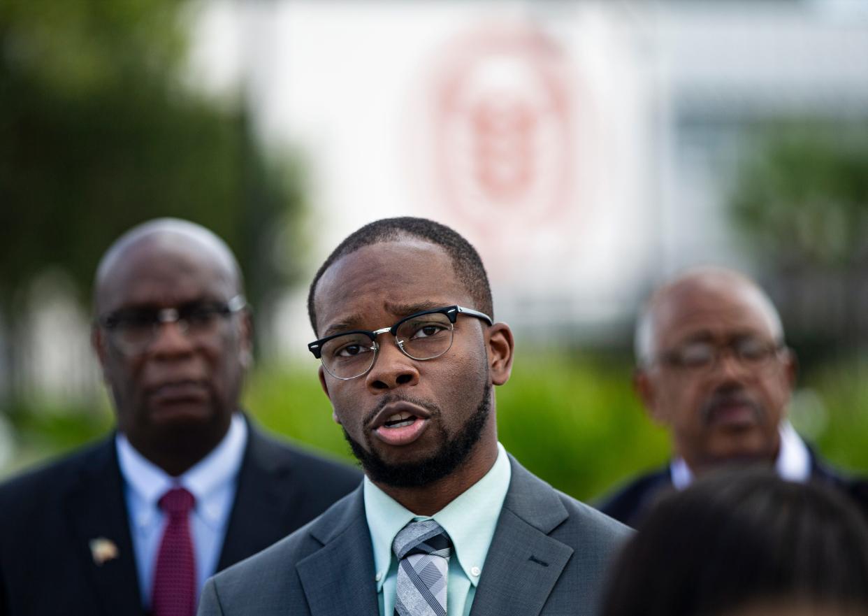 Attorney Joseph North Jr. addresses the media in front of the Babcock Neighborhood School on Babcock Ranch in Charlotte County on Thursday, Oct. 19, 2023. As of Nov. 15, at least eight lawsuits claiming discrimination have been filed against the school.