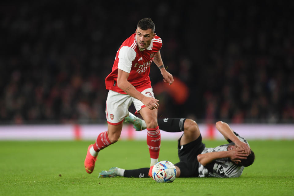 LONDON, ENGLAND - DECEMBER 17: Federico Gatti of Juventus is challenged by Granit Xhaka of Arsenal during the mid-season friendly between Arsenal and Juventus at Emirates Stadium on December 17, 2022 in London, England. (Photo by Harriet Lander/Copa/Getty Images)