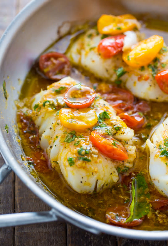 <p>Baker by Nature</p><p>A quick and easy recipe for pan-seared cod in white wine tomato basil sauce! If you love cod fish recipes, try this flavorful dish for dinner.</p><p><strong>Get the recipe: <a href="https://bakerbynature.com/pan-seared-cod-in-white-wine-tomato-basil-sauce/" rel="nofollow noopener" target="_blank" data-ylk="slk:Pan-Seared Cod in White Wine Tomato Basil Sauce;elm:context_link;itc:0;sec:content-canvas" class="link ">Pan-Seared Cod in White Wine Tomato Basil Sauce</a></strong></p>