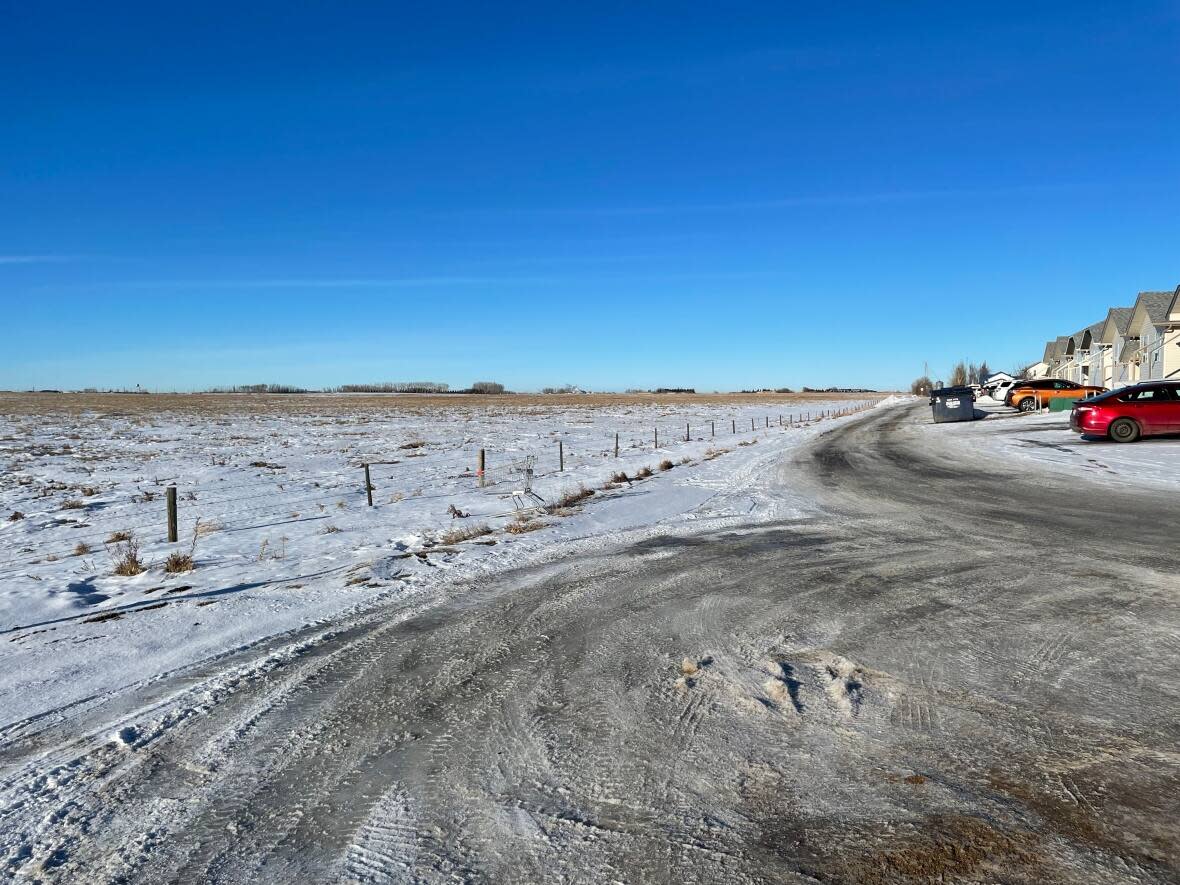 The proposed solar farm would be built on this empty patch of land in the northwestern corner of Brooks, Alta. (Submitted by John Petrie - image credit)