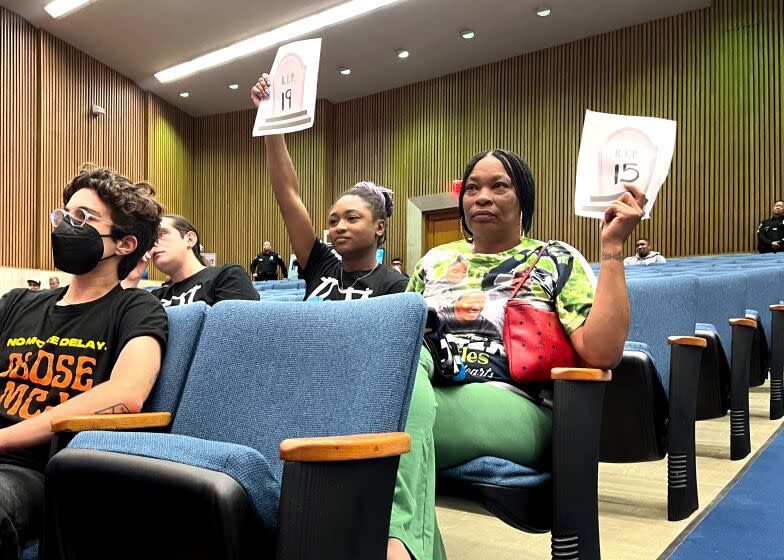 Tennel Crook, right, attends the L.A. County Board meeting at the Hall of Administration in downtown os Angeles oMonday, as the board prepared to vote on the city budget. Crook said that her son, Kamren Lee Nettles, was the 15th inmate to die in county custody this year - on track to be one of the deadliest years in the jails in recent history.