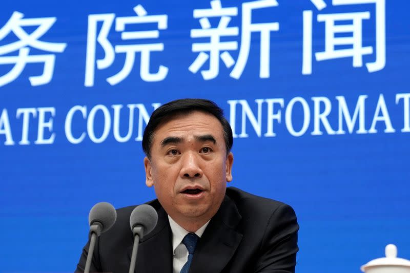 China's Health Commission Vice Minister Li Bin speaks during a news conference in Beijing