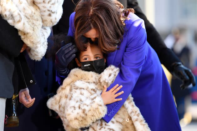 U.S. Vice President Kamala Harris walks the abbreviated parade route with her great niece Amara after President Joe Biden's inauguration on Wednesday.