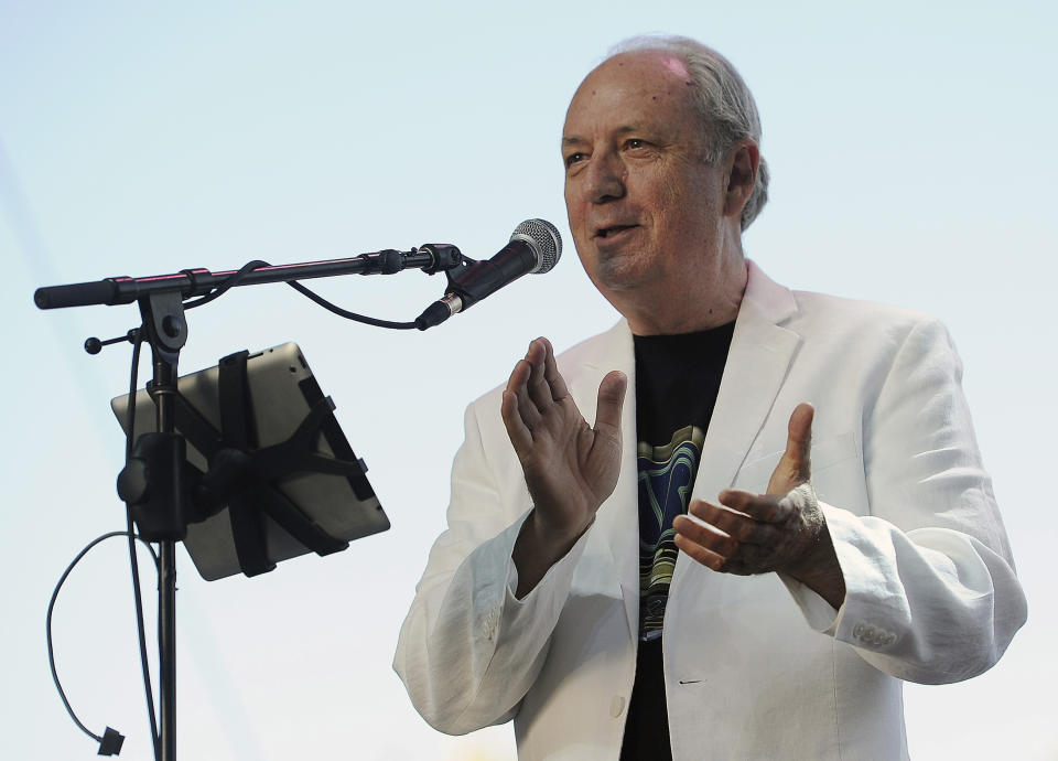 FILE - Michael Nesmith of The Monkees performs at the 2014 Stagecoach Music Festival in Indio, Calif., on April 27, 2014. Nesmith, the guitar-strumming member of the 1960s, made-for-television rock band The Monkees, died at home Friday of natural causes, his family said in a statement. He was 78. (Photo by Chris Pizzello/Invision/AP, File)