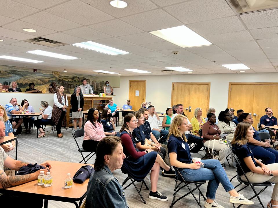 Residents and supporters gather for the ribbon cutting and opening of Matter Health’s new on-site wellness center at Isabella Towers, the first such center at a KCDC community. Aug. 22, 2022