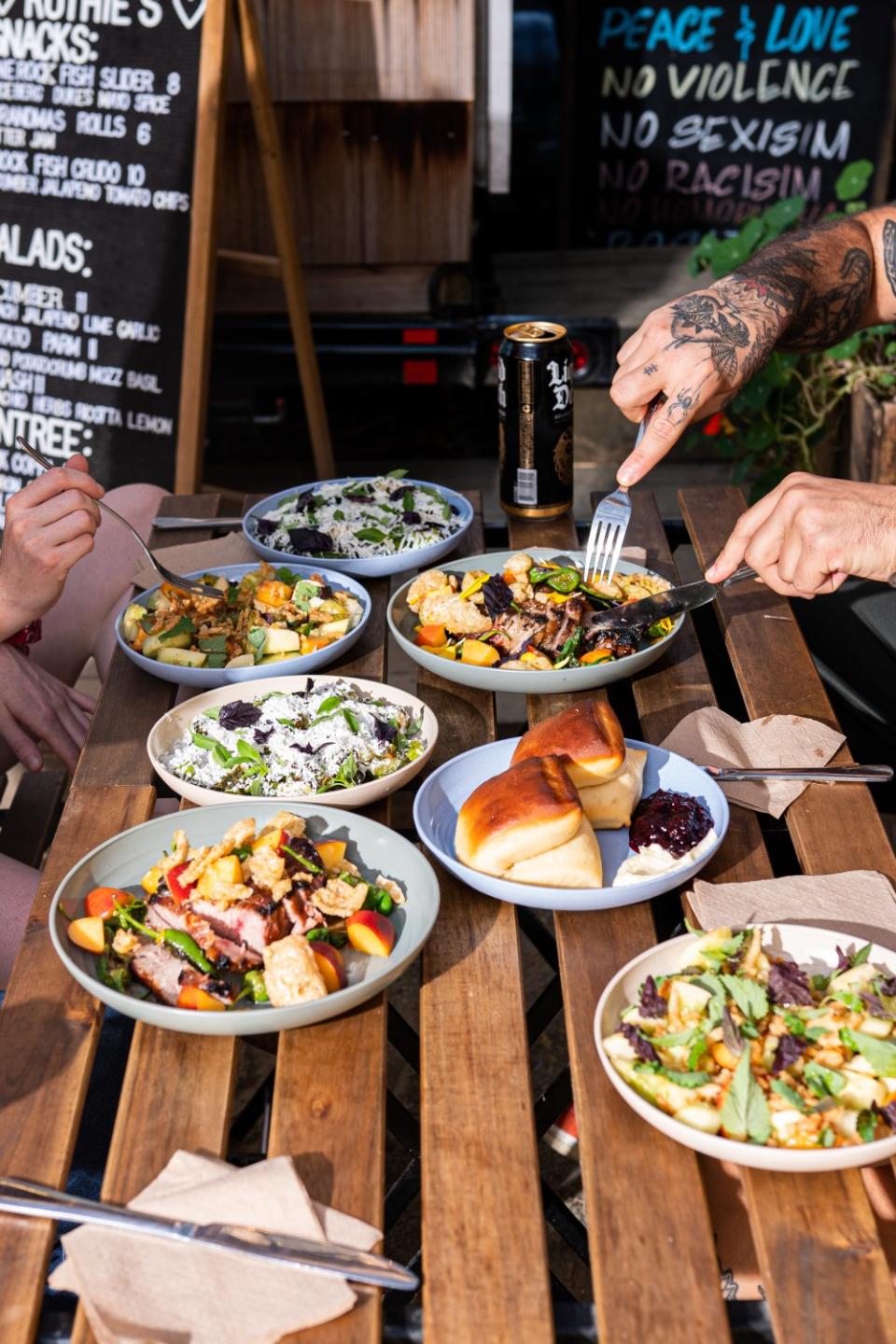 Plates of food on a wooden table