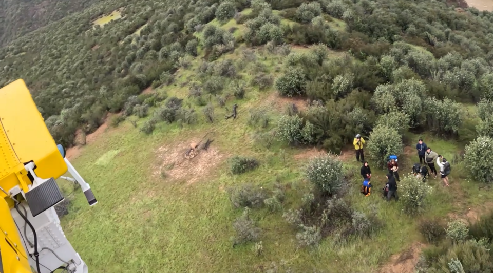 The Ventura County Aviation Unit rescued 11 hikers and three dogs from the Sespe River Trail on March 30, seen in a still from a video.