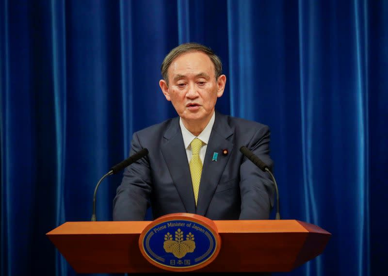 Japanese Prime Minister Yoshihide Suga speaks during a news conference in Tokyo