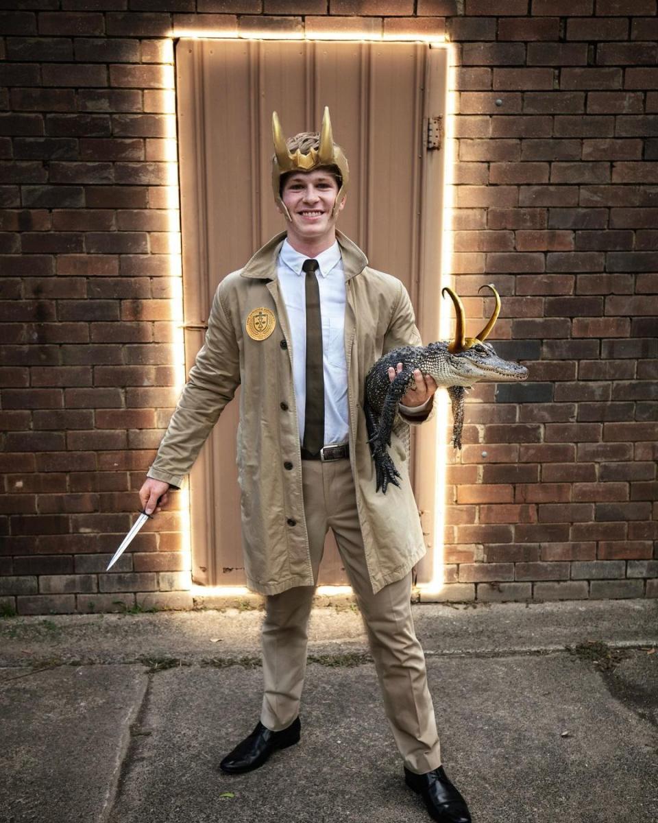 Robert Irwin dressed up for Halloween in 2021 while holding a baby alligator. Photo: Instagram/robertirwinphotography.