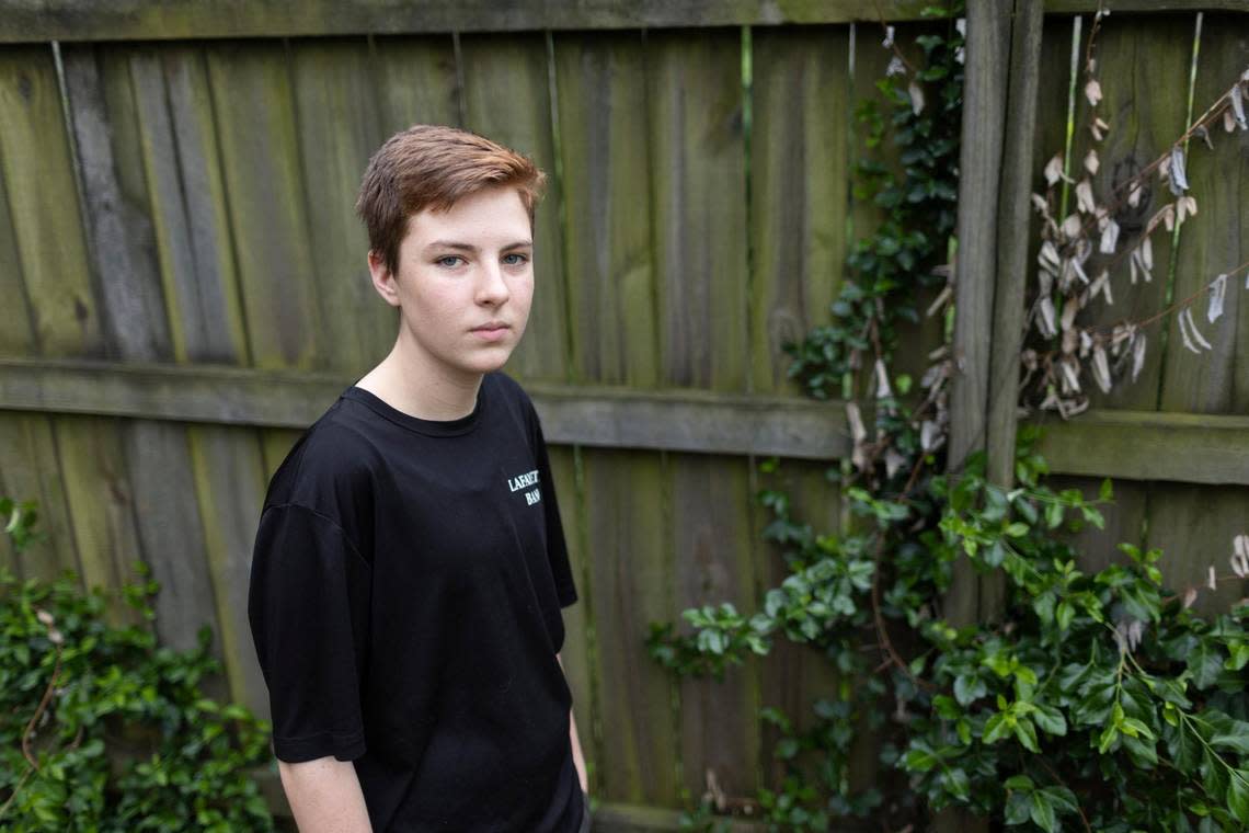 Henry Svec, 13, at his home in Lexington. Henry and his mother Kelly are concerned about the new law that passed out of the Legislature this session banning gender-affirming care for trans youth.