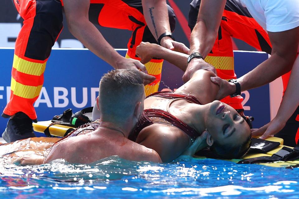 Anita Alvarez of Team United States is attended to by medical staff following her Women's Solo Free Final performance on day six of the Budapest 2022 FINA World Championships