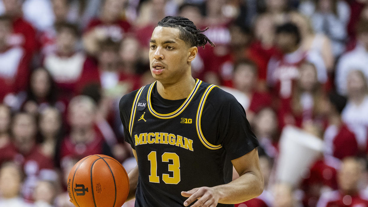 Michigan guard Jett Howard handles the ball during a college basketball game on March 5, 2023. (AP Photo/Doug McSchooler)