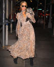 <p>Paris Hilton dresses in head-to-toe cheetah-print while walking back to her apartment with her dog in N.Y.C. on Tuesday. </p>