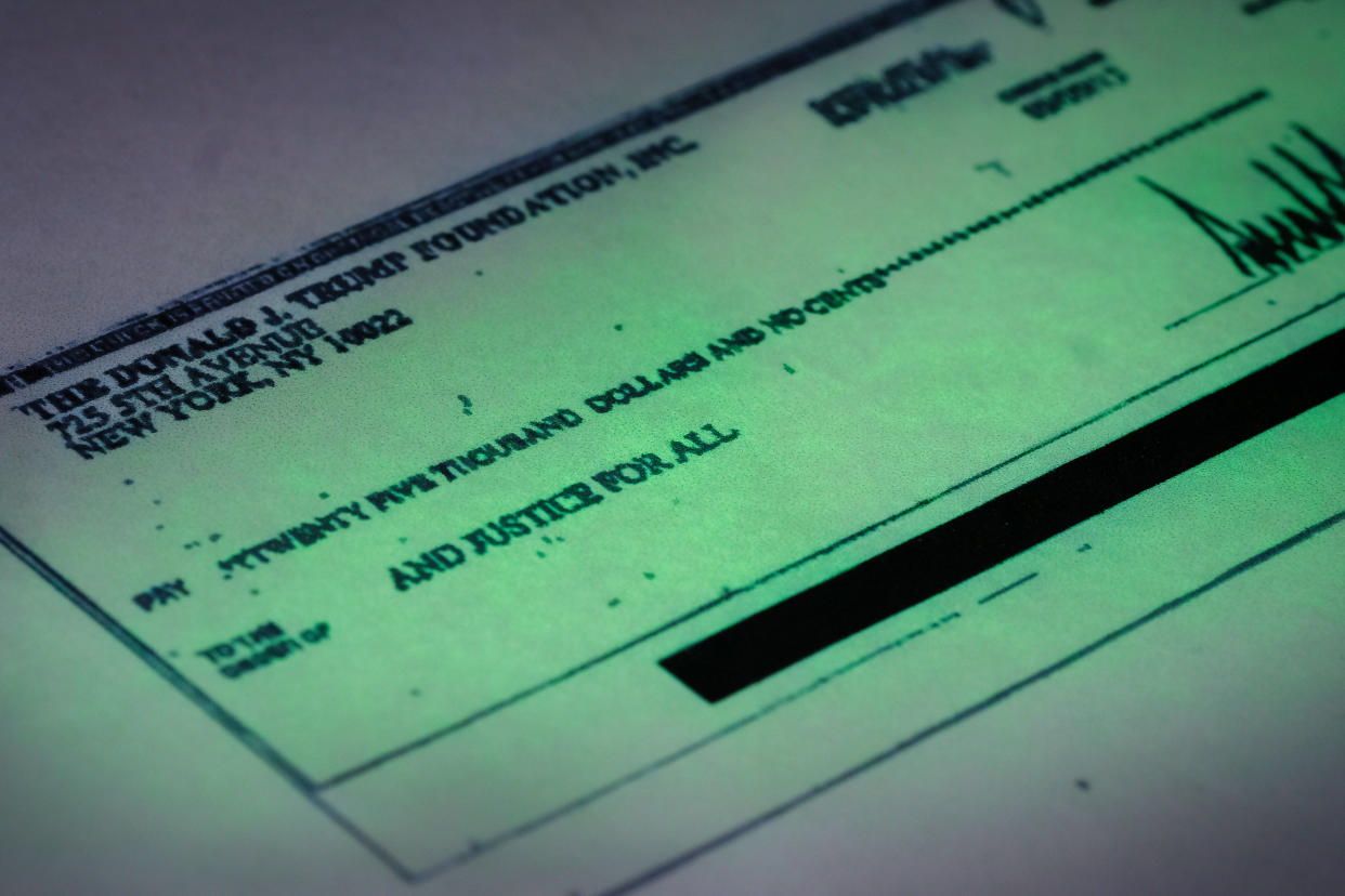 A photo of a check provided by the New York attorney general shows a payment of $25,000 from the Donald J. Trump Foundation to And Justice for All signed by Donald J. Trump, whose campaign said it was a mistake and Trump intended to use personal funds. (Photo: J. David Ake/AP)