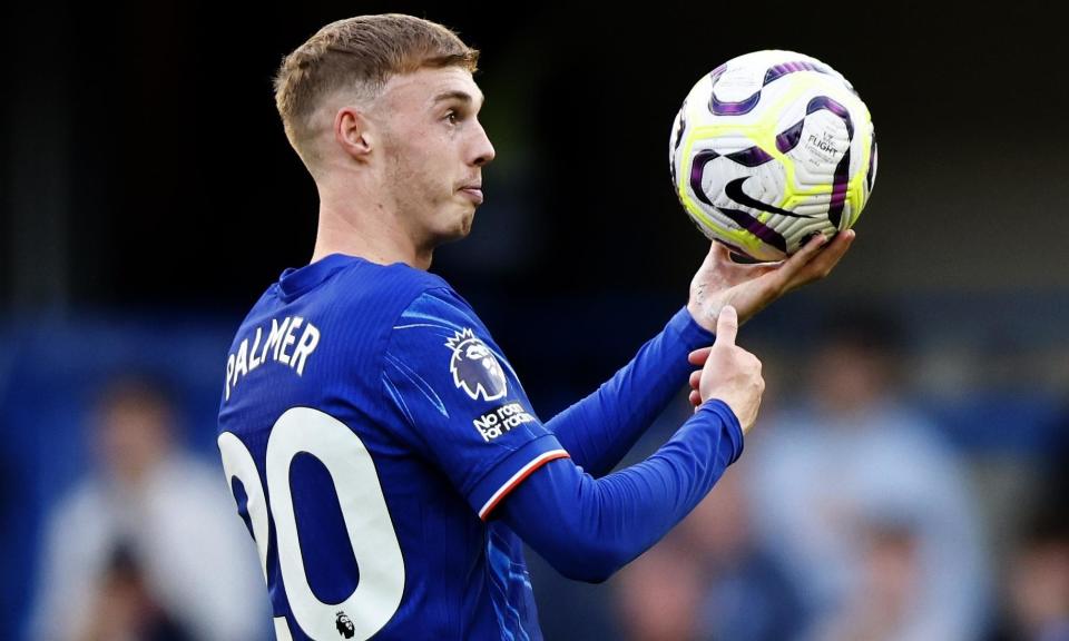 <span>Cole Palmer with a match ball after becoming the first player to score four times in the first half of a Premier League game.</span><span>Photograph: Tolga Akmen/EPA</span>