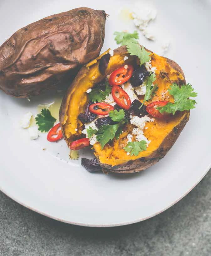 Baked Sweet Potato with Olives, Feta, and Chile