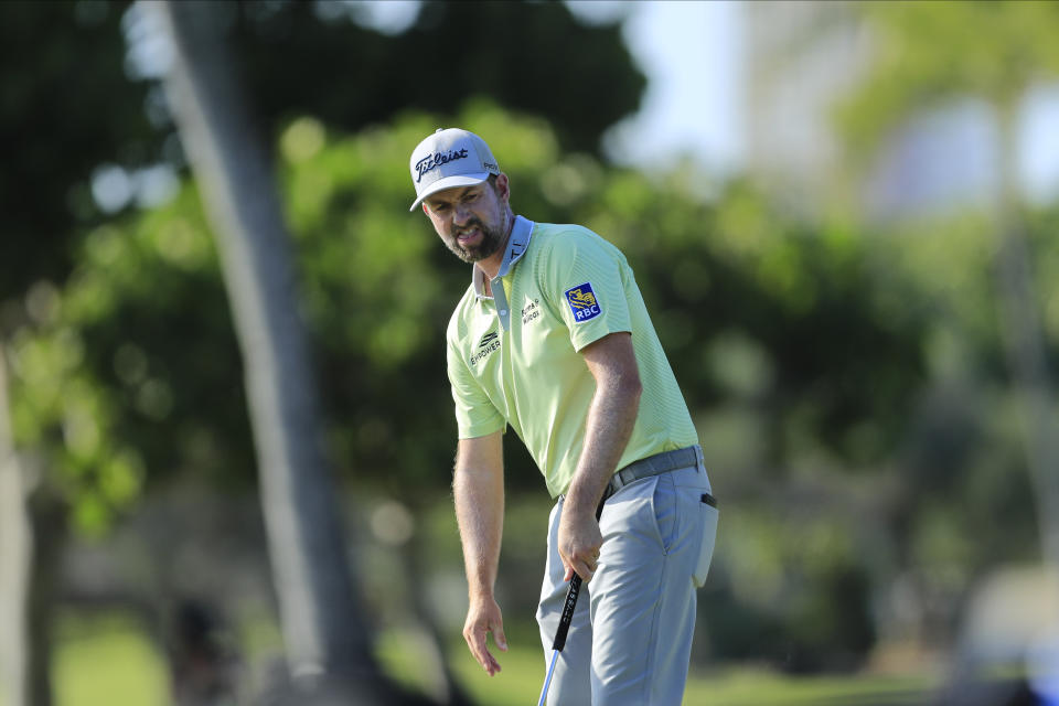 Webb Simpson reacts after missing a putt on the 12th green during the first round of the Sony Open golf tournament Thursday, Jan. 14, 2021, at Waialae Country Club in Honolulu. (AP Photo/Jamm Aquino)