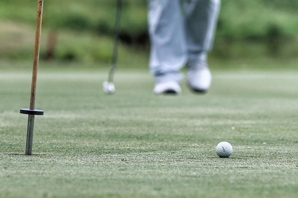 People are seen playing golf at the Seri Selangor Golf Club in Petaling Jaya February 13, 2021. ― Picture by Ahmad Zamzahuri